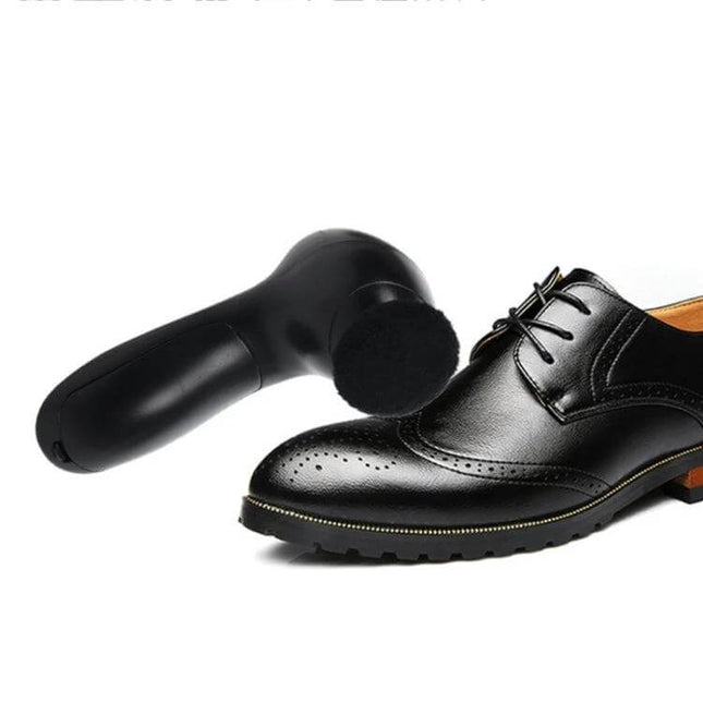 Shoe Dryer Portable for Leather Care and Maintenance compact battery-powered plastic shoe dryer beside black leather dress shoe