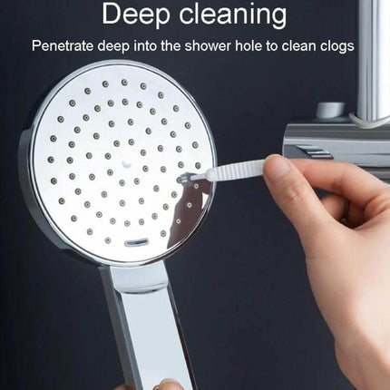 Shower Hole Cleaning Brush 10 Pack For Faucets And Drains - hand using slim nylon brush to clean shower head holes and remove mineral buildup