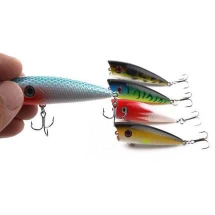 Simulation Hard Baits Lures Set 6 Cm For Saltwater And Freshwater - hand holding 6cm life-like multi-color hard baits with treble hooks