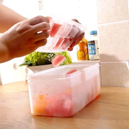 Small Square Ice Mold Trays Five-Layer With Cover Storage Box showing pink ice cubes being popped into the matching storage box