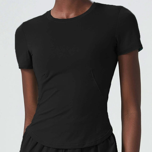 Small Waist Yoga Top With Short Sleeves In Black For Studio Practice fitted short-sleeve training shirt on model, quick-drying nylon, studio-ready look