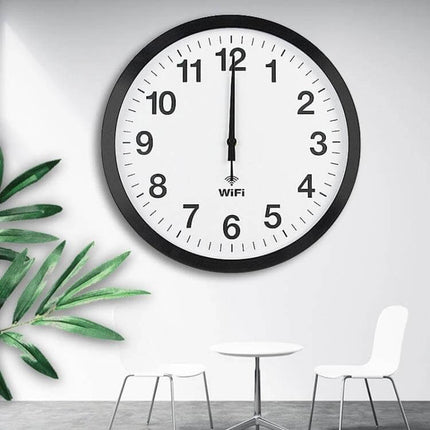 Smart WiFi Wall Clock With Time Synchronization, Living Room - minimalist metal shell clock with PVC mirror face and aluminum pointer in a modern living room