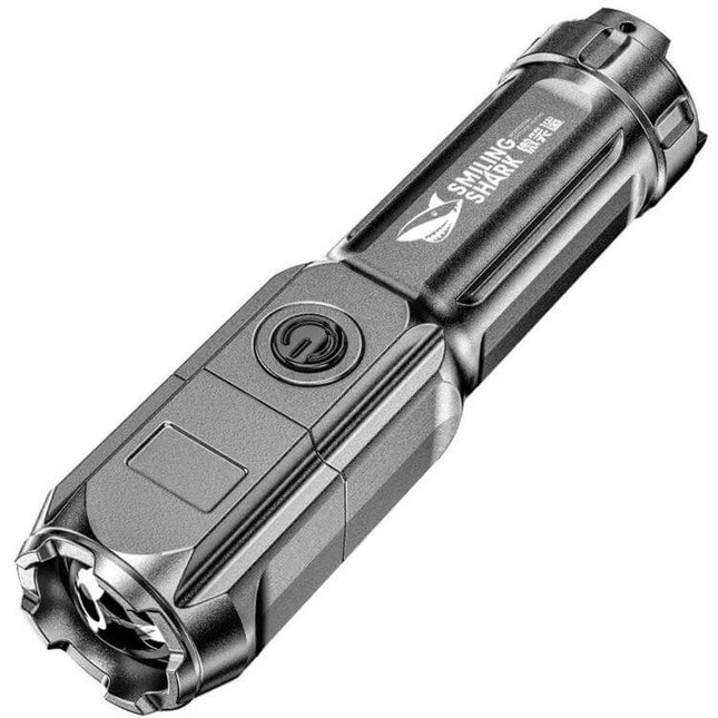 Smiling Shark LED Flashlight With Telescopic Focus For Outdoor Use compact 5500mAh USB rechargeable flashlight shown at angle, slim grip for camping and emergencies