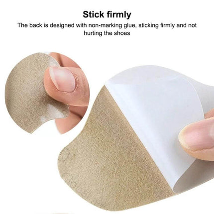 Sneaker Heel Protectors Self Adhesive For Everyday Wear - close-up of microfiber leather pad with non-marking adhesive being peeled and applied