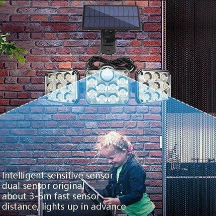 Solar 3-Head Rotatable Outdoor Wall Light For Garden mounted with solar panel, three adjustable LED heads and motion sensor illuminating pathway