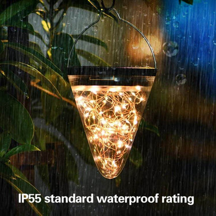 Solar Conical Starlight Pendant Lamp IP55 Outdoor Garden glowing in rain, hanging solar-powered waterproof pendant illuminating garden pathway