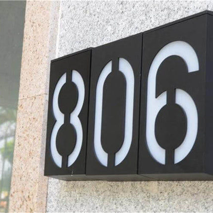 Solar Door Plate Light For House Numbers Outdoor Night Use - weatherproof 69-LED illuminated address plaque showing 806 on exterior wall