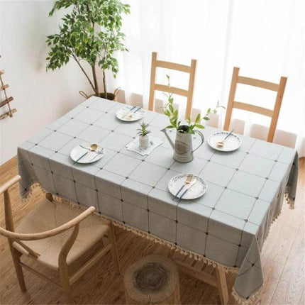 Square Lattice Embroidered Tablecloth, Tassel Border on dining table with neutral linens and decor