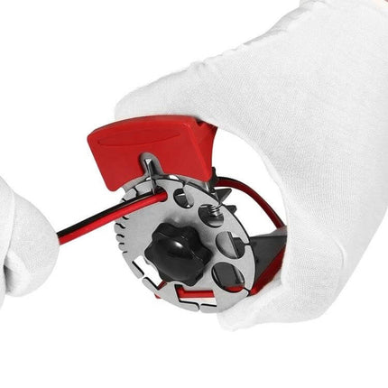 Stainless Steel Adjustable Handheld Wire Stripper With 14 Hole Sizes held and stripping insulated red and black wires