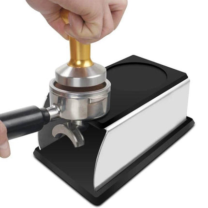 Stainless Steel Espresso Tamper Stand For Home Barista Use — stainless steel body with silicone top holding portafilter and tamper