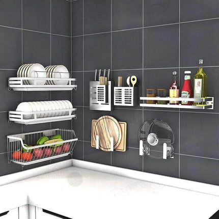 Stainless Steel Wall-Mounted Kitchen Rack for Seasonings 40x12.5x7 cm mounted on tiled kitchen wall holding spices, jars and utensils