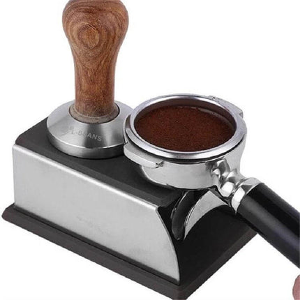 Stainless Steel Espresso Tamper Stand For Home Barista Use with wooden-handled tamper and portafilter on counter