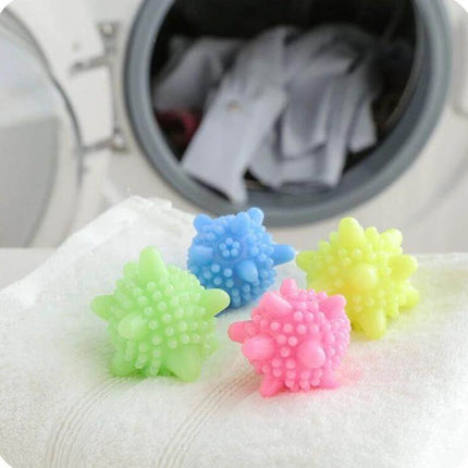 Starfish Laundry Cleaning Ball Anti Winding Decontamination 5 Pack - colorful spiky starfish laundry balls on towel in front of washing machine
