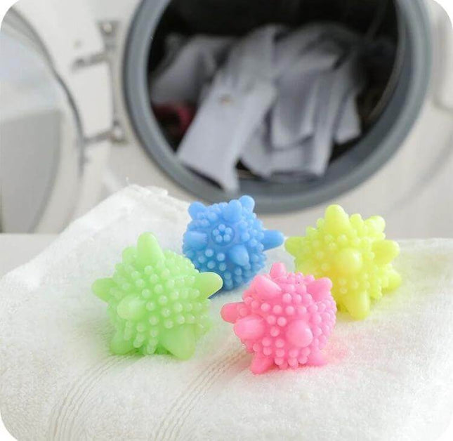 Starfish Laundry Cleaning Ball Anti Winding Decontamination 5 Pack - colorful spiky starfish laundry balls on towel in front of washing machine