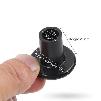 Stiletto Heel Protector Caps, Non-Slip For Safer Walking In Heels black PVC heel tip cap held between fingers
