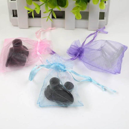 Stiletto Heel Protector Caps, Non-Slip For Safer Walking In Heels displayed in organza pouches, PVC non-slip heel tip covers for weddings and parties