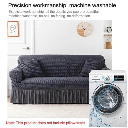 Stretch Sofa Cover With Skirt for Double M 145-185cm Sofas in grey seersucker fabric with lotus-leaf skirt, machine washable, protects against spills and pet hair
