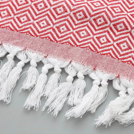 Striped Cotton Bath Towel With Tassels For Everyday Use showing red geometric stripes and white tassels on woven cotton-linen fabric