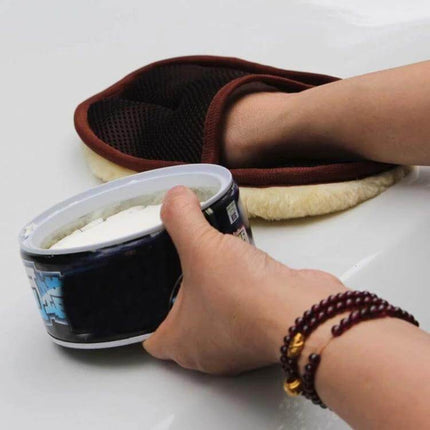 Wool Soft Gloves for Cleaning Cars and Motorcycles being used with foam to gently scrub a car surface