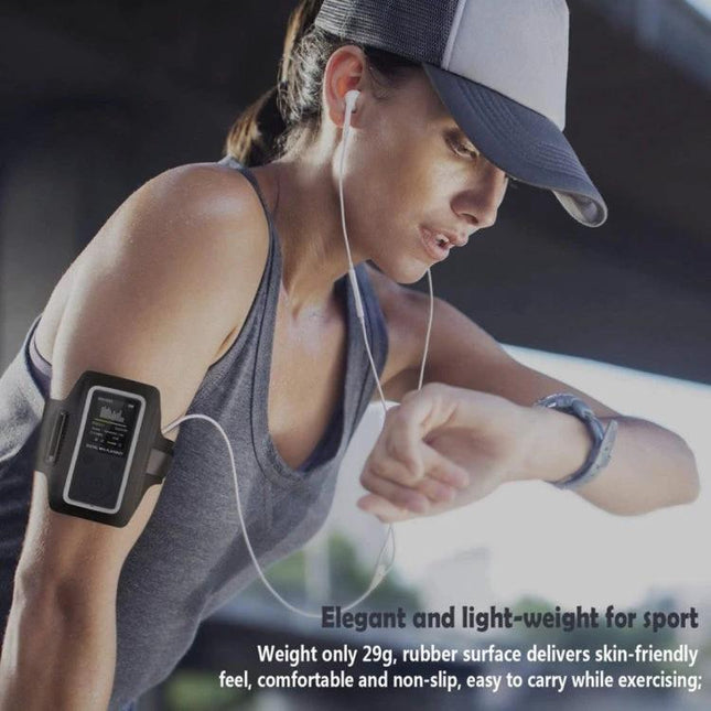 Compact Portable MP4 Player for Music, Radio, and Recording worn on arm during workout, 1.8-inch TFT display showing track info