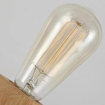 Minimalist Wooden Table Lamp for Your Bedroom Nightstand showing close-up of exposed filament bulb and wooden base for cozy bedside lighting