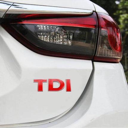 TDI 3D Badge Emblem Car Decal Sticker for Vehicle Decoration applied on white car rear near taillight