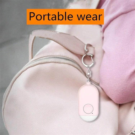 Rechargeable Personal Safety Alarm with Flashlight for Daily Protection – compact pink keychain alarm with flashlight hanging on backpack