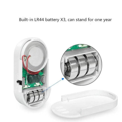 Door and Window Security Alarm for Home Entry Protection compact unit showing built-in LR44 battery compartment and internal electronics