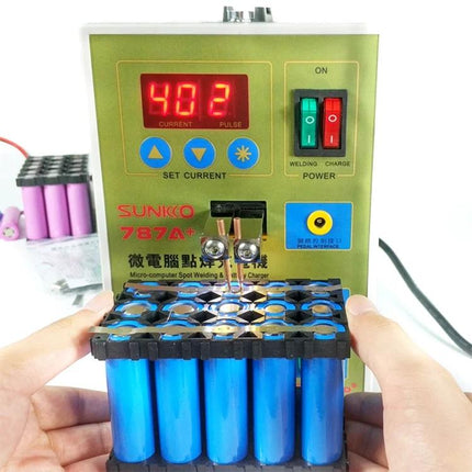 SUKKO LED Pulse Spot Welder for Battery and Metal Repairs showing device welding a blue lithium battery pack with digital display and controls