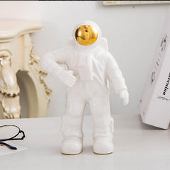 Jarrón de cerámica con flores secas y diseño de astronauta para decoración de mesa