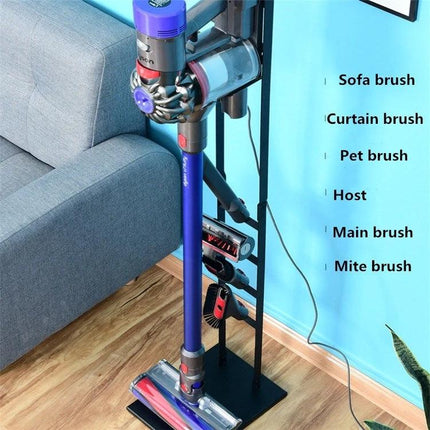 Dyson Vacuum Cleaner Wall-Mounted Storage Bracket Solution holding a Dyson with multiple accessory brushes organized off the floor