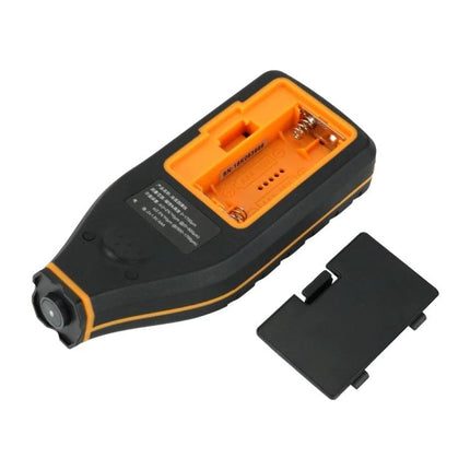 SNDWAY Gauge for Measuring Car Paint Thickness and Coating handheld device with battery compartment open and black cover removed