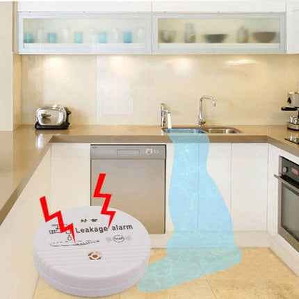 Household Water Leak and Overflow Detection Alarm placed in kitchen detecting sink overflow with audible alert to prevent water damage