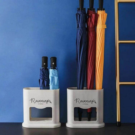 Four-Hole Umbrella Storage Rack for Home Entrance Organization holding folded and long umbrellas in a tidy modern entrance