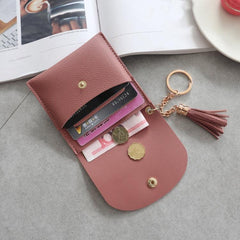 Cartera de moda para mujer, cartera corta de cuero, mini cartera informal para tarjetas de identificación, bolso de mano con borlas para mujer