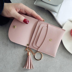 Cartera de moda para mujer, cartera corta de cuero, mini cartera informal para tarjetas de identificación, bolso de mano con borlas para mujer