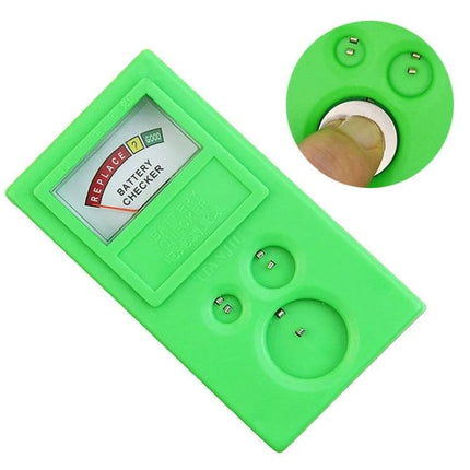 Handheld Green Watch Battery Tester for Button Cells showing capacity dial and button cell slots for watch battery checks