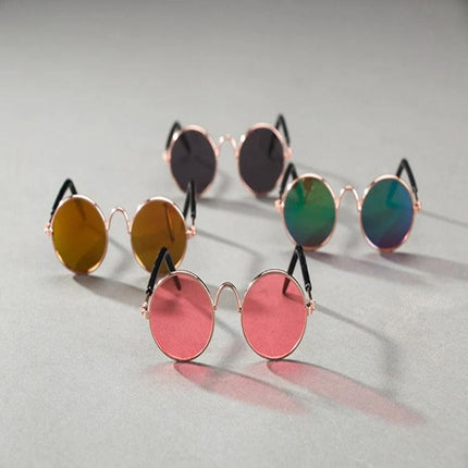 Pet Sunglasses for Stylish Outdoor Adventures with Dogs - round metal pet sunglasses in pink, gold and green for dogs and cats