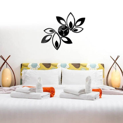 Flower Art Modern DIY 3D Crystal Mirror Wall Clock mounted above a modern bed with floral headboard, self-adhesive 65×45cm acrylic mirror clock