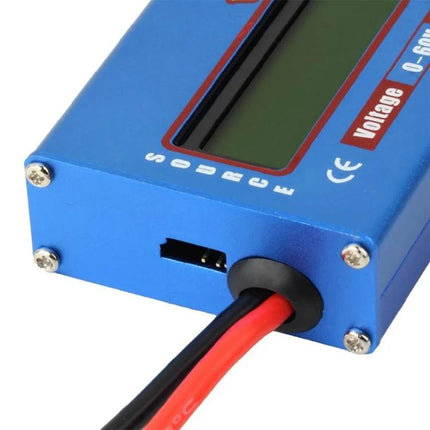 Compact Wattmeter for Everyday Electrical Monitoring blue compact wattmeter with display and red black power leads
