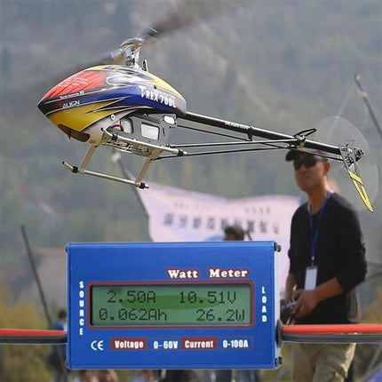 Compact Wattmeter for Everyday Electrical Monitoring showing real-time voltage, current and power readings on RC helicopter battery test