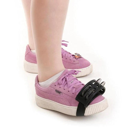 Aluminum Foot Bell for Home Music Practice Sessions strapped to sneaker for hands-free rhythm practice
