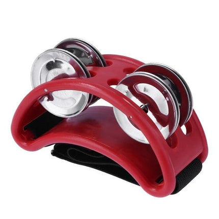 Aluminum Foot Bell for Home Music Practice Sessions attached to foot with red plastic frame and adjustable strap