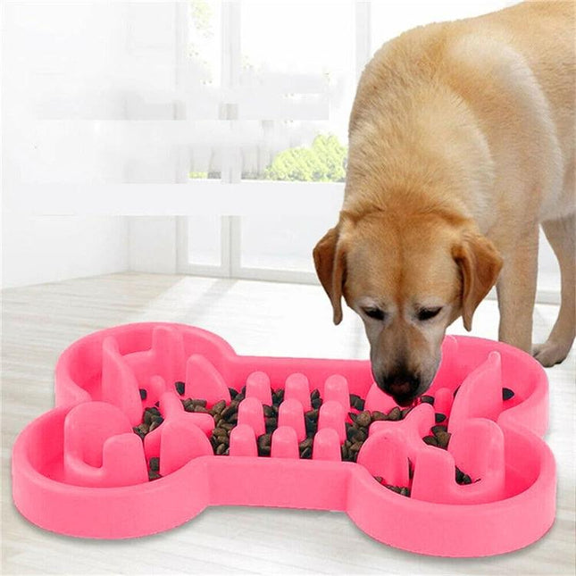 Silicone Slow-Feeder Bowl for Dogs at Daily Mealtime with pink bone-shaped silicone slow feeder and dog eating kibble