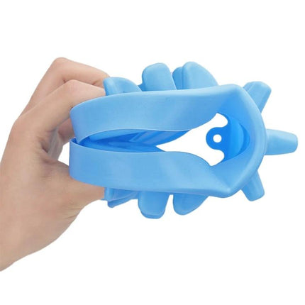 Silicone Slow-Feeder Bowl for Dogs at Daily Mealtime - blue flexible silicone slow feeder held in hand to slow fast-eating dogs