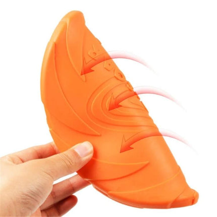 Rubber Flying Disc for Outdoor Dog Play and Training — orange flexible floating toy for fetch and training