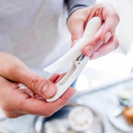 Electric Latte Art Pen for Coffee and Cake Decorating held in hands demonstrating assembly and precise control for latte and dessert art