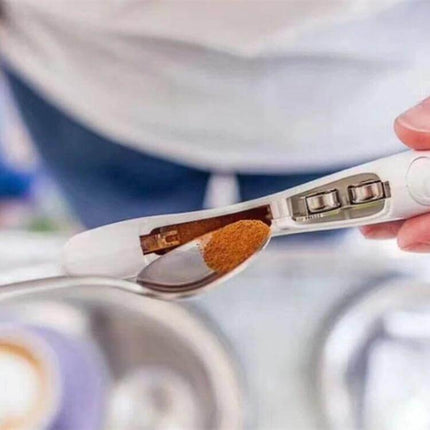 Electric Latte Art Pen for Coffee and Cake Decorating showing precise cocoa powder dispensing over a spoon for latte and dessert decoration