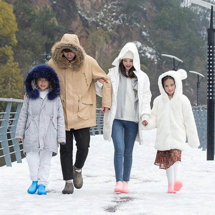 Reusable Waterproof PVC Rain Boot Covers for Outdoor Protection - family walking in snowy park wearing colorful boot covers