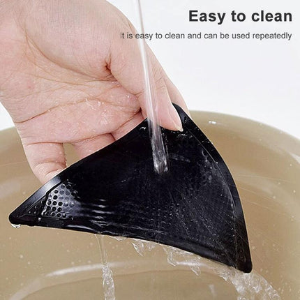Non-Slip Stickers for Safer Bathroom Floors at Home - hand rinsing a black non-slip sticker, easy to clean and reusable